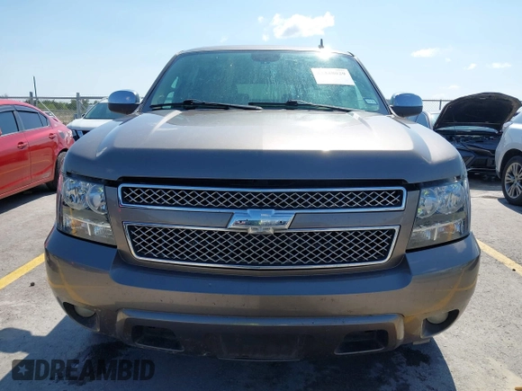 2011 Chevrolet Suburban LT with VIN 1GNSCJE03BR396610, listed as a IAAI auction lot 42348029 with 249,280 mi miles and . Bid and sale history available at DreamBid. Image 12.