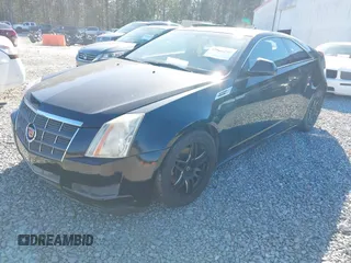2011 Cadillac CTS with VIN 1G6DC1EDXB0153131, listed as a IAAI auction lot 41606098 with 141,605 mi miles and . Bid and sale history available at DreamBid. Image 2.