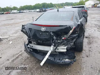 2014 Cadillac CTS AWD z VIN 1G6AW5SX4E0129136, wystawiony jako IAAI lot #42364098 z przebiegiem 137 080 mil mil oraz . Historia ofert i sprzedaży dostępna na DreamBid. Obrazek 6.