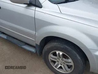 2005 Honda Pilot EX-L z VIN 5FNYF18695B018134, wystawiony jako IAAI lot #41962595 z przebiegiem 264 599 mil mil oraz . Historia ofert i sprzedaży dostępna na DreamBid. Obrazek 6.