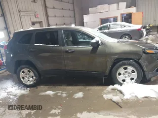 2015 Jeep Cherokee Sport with VIN 1C4PJMAB8FW738718, listed as a IAAI auction lot 41575745 with 113,227 mi miles. Bid and sale history available at carsss.com. Image 13.