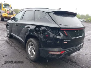 2022 Hyundai Tucson SEL z VIN 5NMJBCAE9NH015906, wystawiony jako IAAI lot #42169136 z przebiegiem 28 009 mil mil oraz . Historia ofert i sprzedaży dostępna na DreamBid. Obrazek 3.