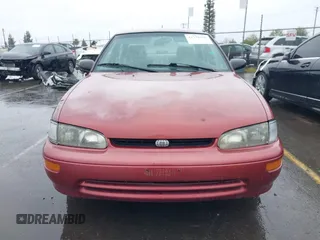 1997 Geo Prizm LSi with VIN 1Y1SK5265VZ457659, listed as a IAAI auction lot 41778510 with 149,073 mi miles. Bid and sale history available at carsss.com. Image 12.