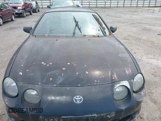 1995 Toyota Celica ST with VIN JT2AT00F7S0040443, listed as a IAAI auction lot 42125327 with 286,767 mi miles. Bid and sale history available at carsss.com. Image 6.