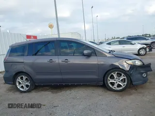 2009 Mazda 5 Sport with VIN JM1CR29L990341261, listed as a IAAI auction lot 41522567 with 123,465 mi miles and . Bid and sale history available at DreamBid. Image 13.