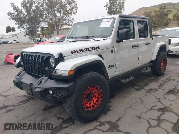 2021 Jeep Gladiator Willys with VIN 1C6HJTAG1ML572638, listed as a IAAI auction lot 42065562 with 43,040 mi miles and . Bid and sale history available at DreamBid. Image 17.