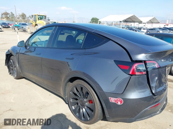2023 Tesla Model Y Performance with VIN 7SAYGDEF5PF823122, listed as a IAAI auction lot 41546480 with 12,943 mi miles and . Bid and sale history available at DreamBid. Image 3.