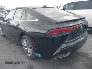 2021 Toyota Mirai XLE with VIN JTDAAAAA1MA002323, listed as a IAAI auction lot 42034157 with 16,592 mi miles and . Bid and sale history available at carsss.com. Image 3.