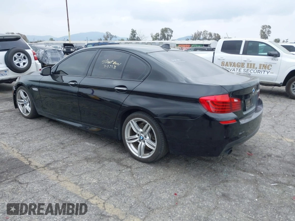 2015 BMW 5 Series 535i with VIN WBA5B1C55FG128387, listed as a IAAI auction lot 41885806 with 94,734 mi miles and . Bid and sale history available at carsss.com. Image 3.
