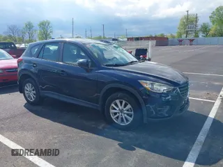 2016 Mazda CX-5 Sport with VIN JM3KE2BY3G0740488, listed as a IAAI auction lot 42000449 with 43,009 mi miles. Bid and sale history available at carsss.com. Image 1.