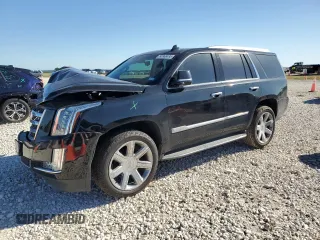 2019 Cadillac Escalade Luxury z VIN 1GYS4BKJXKR389513, wystawiony jako Copart lot #53869495 z przebiegiem 98 892 mil mil oraz Szkody całkowita. Historia ofert i sprzedaży dostępna na DreamBid. Obrazek 1.