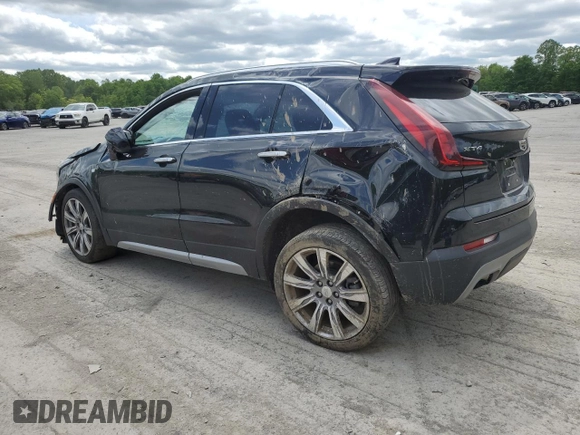 2020 Cadillac XT4 FWD Premium Luxury with VIN 1GYFZCR46LF113499, listed as a Copart auction lot 57534205 with 64,859 mi miles and Salvage title. Bid and sale history available at DreamBid. Image 2.