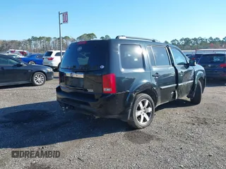2013 Honda Pilot Touring with VIN 5FNYF4H9XDB047796, listed as a IAAI auction lot 41591189 with 188,579 mi miles and . Bid and sale history available at carsss.com. Image 4.