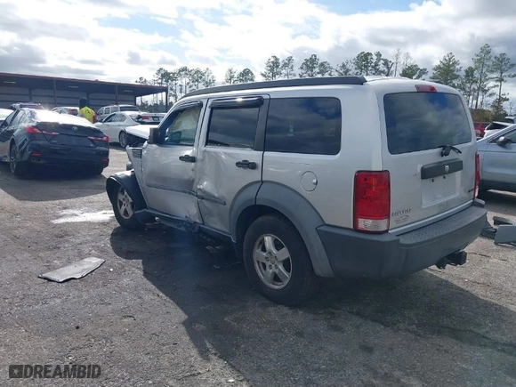 2007 Dodge Nitro SXT with VIN 1D8GT28K97W683073, listed as a IAAI auction lot 41123780 with 191,877 mi miles. Bid and sale history available at carsss.com. Image 3.
