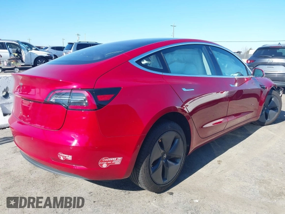 2018 Tesla Model 3 Long Range Battery z VIN 5YJ3E1EA4JF022284, wystawiony jako IAAI lot #41422203 z przebiegiem 71 521 mil mil oraz . Historia ofert i sprzedaży dostępna na DreamBid. Obrazek 4.