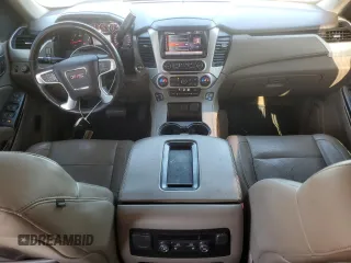 2015 GMC Yukon XL SLT with VIN 1GKS1HKC3FR188825, listed as a Copart auction lot 88904935 with 201,178 mi miles and Salvage Title. Bid and sale history available at carsss.com. Image 8.