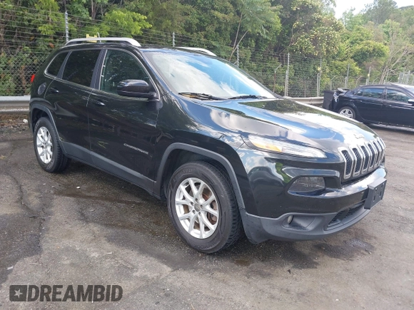 2015 Jeep Cherokee Latitude z VIN 1C4PJMCB4FW648897, wystawiony jako IAAI lot #42182493 z przebiegiem 129 457 mil mil oraz . Historia ofert i sprzedaży dostępna na DreamBid. Obrazek 1.