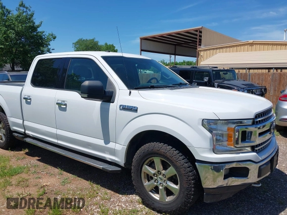2018 Ford F-150 XL with VIN 1FTFW1E5XJKE02519, listed as a IAAI auction lot 42180274 with 184,101 mi miles. Bid and sale history available at carsss.com. Image 1.