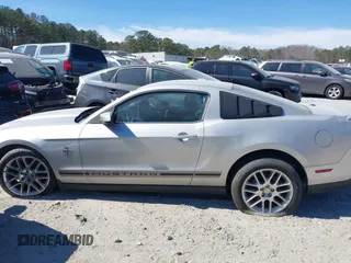 2012 Ford Mustang V6 Premium with VIN 1ZVBP8AM1C5265745, listed as a IAAI auction lot 41705931 with 145,000 mi miles. Bid and sale history available at carsss.com. Image 14.