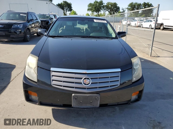2004 Cadillac CTS with VIN 1G6DM577040103840, listed as a Copart auction lot 55284675 with 113,007 mi miles and Salvage title. Bid and sale history available at DreamBid. Image 5.
