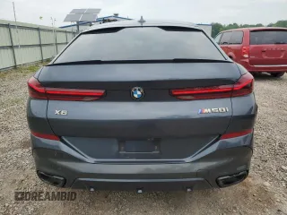2021 BMW X6 M50i z VIN 5UXCY8C04M9D98591, wystawiony jako Copart lot #60606155 z przebiegiem 90 639 mil mil oraz Czysty tytuł • Clean title. Historia ofert i sprzedaży dostępna na DreamBid. Obrazek 6.