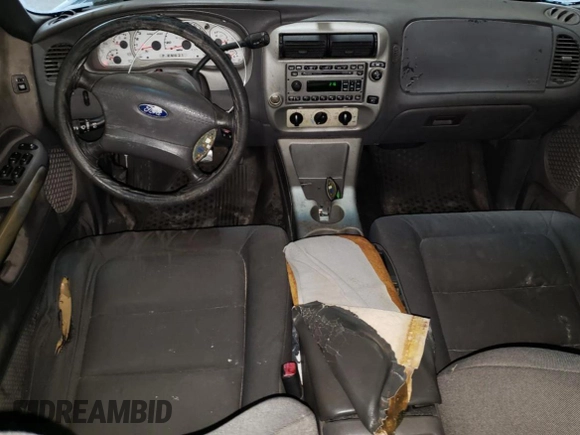 2001 Ford Explorer Sport Trac z VIN 1FMZU67E11UC81408, wystawiony jako Copart lot #64420975 z przebiegiem 185 127 mil mil oraz Szkoda całkowita • Salvage title. Historia ofert i sprzedaży dostępna na DreamBid. Obrazek 8.