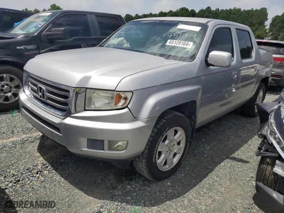 2012 Honda Ridgeline RTS with VIN 5FPYK1F41CB457054, listed as a Copart auction lot 65120104 with 170,740 mi miles and Salvage Title. Bid and sale history available at carsss.com. Image 1.