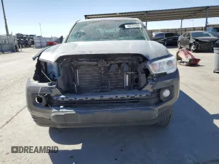 2023 Toyota Tacoma SR5 z VIN 3TMAZ5CNXPM207548, wystawiony jako Copart lot #48767455 z przebiegiem 21 729 mil mil oraz Szkoda całkowita • Salvage title. Historia ofert i sprzedaży dostępna na DreamBid. Obrazek 5.