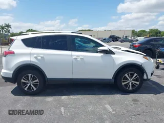 2018 Toyota RAV4 XLE with VIN 2T3WFREV9JW490324, listed as a IAAI auction lot 42298261 with 167,727 mi miles and . Bid and sale history available at DreamBid. Image 13.