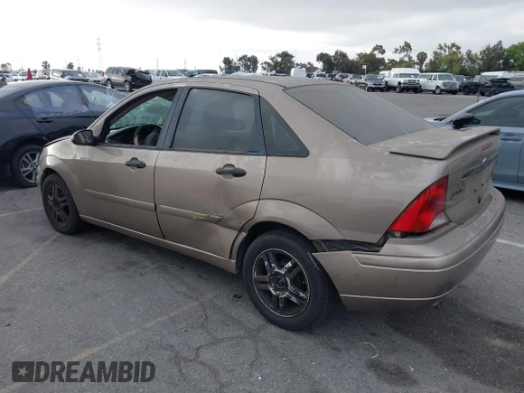 2003 Ford Focus SE z VIN 1FAFP34Z73W236474, wystawiony jako IAAI lot #39378102 z przebiegiem 183 280 mil mil oraz . Historia ofert i sprzedaży dostępna na DreamBid. Obrazek 3.