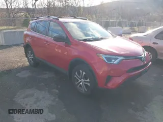 2016 Toyota RAV4 LE with VIN JTMBFREVXGJ100692, listed as a IAAI auction lot 41847333 with 130,822 mi miles. Bid and sale history available at carsss.com. Image 1.