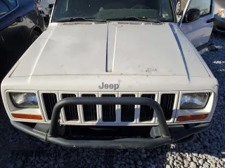 2001 Jeep Cherokee Sport z VIN 1J4FF48S71L532376, wystawiony jako Copart lot #81408644 z przebiegiem 230 058 mil mil oraz Szkoda całkowita • Salvage title. Historia ofert i sprzedaży dostępna na DreamBid. Obrazek 11.