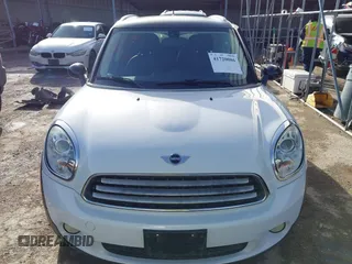 2012 MINI Countryman z VIN WMWZB3C53CWM02541, wystawiony jako IAAI lot #41720086 z przebiegiem 99 820 mil mil oraz . Historia ofert i sprzedaży dostępna na DreamBid. Obrazek 12.