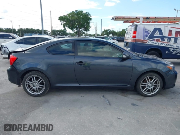 2006 Scion tC z VIN JTKDE177360077653, wystawiony jako IAAI lot #42258872 z przebiegiem 92 187 mil mil oraz . Historia ofert i sprzedaży dostępna na DreamBid. Obrazek 14.