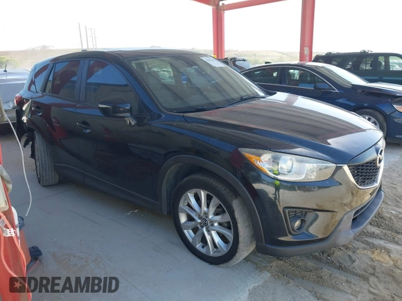 2015 Mazda CX-5 Grand Touring with VIN JM3KE4DY7F0481883, listed as a IAAI auction lot 42091709 with 184,248 mi miles and . Bid and sale history available at DreamBid. Image 14.