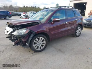 2010 Acura RDX Tech Pkg with VIN 5J8TB1H57AA001303, listed as a IAAI auction lot 41260059 with 217,546 mi miles. Bid and sale history available at carsss.com. Image 2.