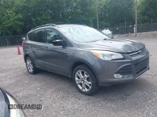 2013 Ford Escape SE with VIN 1FMCU9GX9DUA21125, listed as a IAAI auction lot 42606578 with 143,612 mi miles and . Bid and sale history available at DreamBid. Image 1.