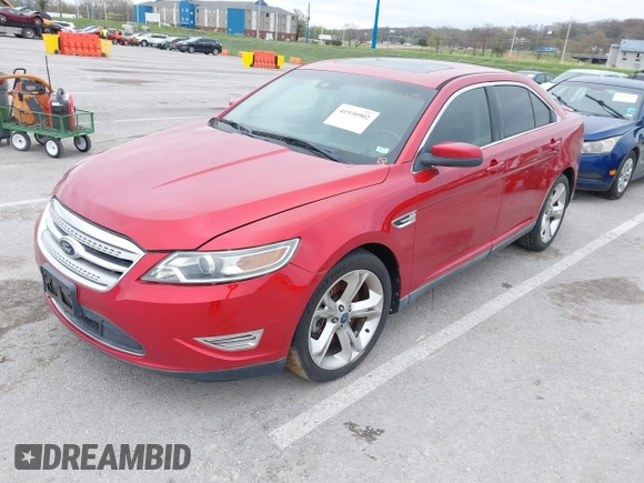 2010 Ford Taurus SHO with VIN 1FAHP2KT4AG122263, listed as a IAAI auction lot 41930902 with 128,977 mi miles and . Bid and sale history available at DreamBid. Image 2.