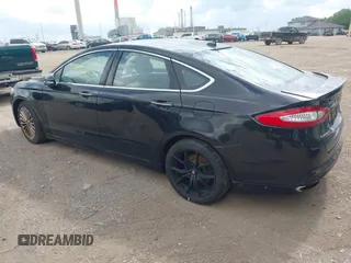 2016 Ford Fusion Titanium with VIN 3FA6P0K97GR135106, listed as a IAAI auction lot 42269165 with 155,036 mi miles and . Bid and sale history available at DreamBid. Image 3.