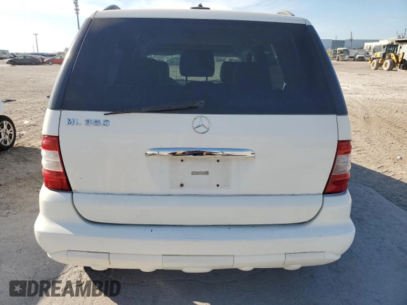 2005 Mercedes-Benz M-Class 3.7L with VIN 4JGAB57E55A559036, listed as a Copart auction lot 83024234 with 164,454 mi miles and Salvage Title. Bid and sale history available at carsss.com. Image 6.