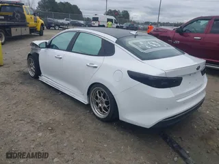 2018 Kia Optima S with VIN 5XXGT4L32JG241187, listed as a IAAI auction lot 41869628 with 88,038 mi miles. Bid and sale history available at carsss.com. Image 3.