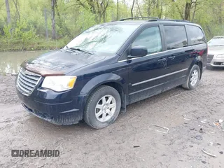 2010 Chrysler Town & Country Touring with VIN 2A4RR5D15AR170014, listed as a IAAI auction lot 42202810 with 199,557 mi miles and . Bid and sale history available at DreamBid. Image 2.