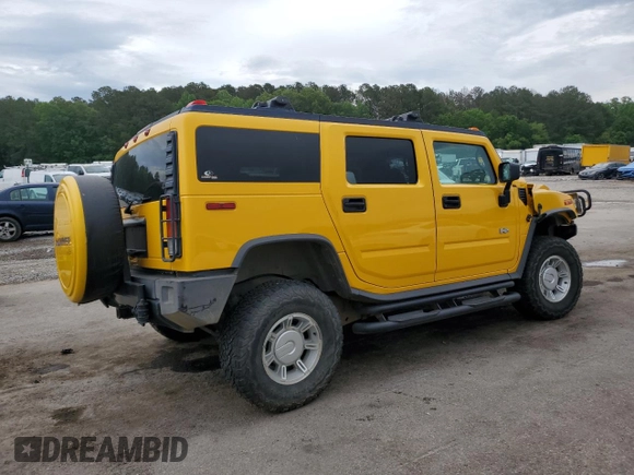 2003 Hummer H2 z VIN 5GRGN23U73H146894, wystawiony jako Copart lot #53449905 z przebiegiem 153 870 mil mil oraz Szkoda całkowita • Salvage title. Historia ofert i sprzedaży dostępna na DreamBid. Obrazek 3.