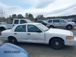 2000 Ford Crown Victoria Police Interceptor z VIN 2FAFP71W6YX169248, wystawiony jako IAAI lot #41974053 z przebiegiem 230 658 mil mil oraz . Historia ofert i sprzedaży dostępna na DreamBid. Obrazek 13.