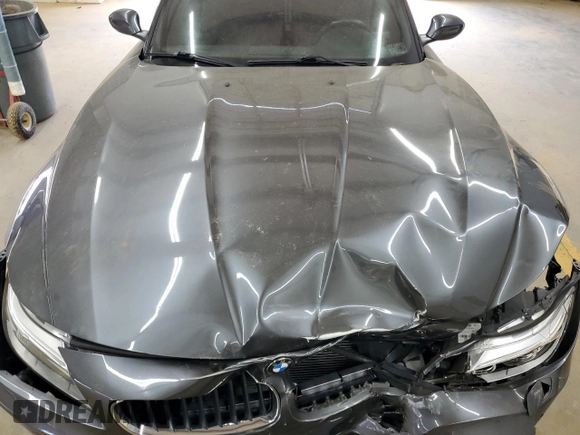 2015 BMW Z4 sDrive28i with VIN WBALL5C52FP557059, listed as a Copart auction lot 71438184 with Not provided miles and Salvage title. Bid and sale history available at DreamBid. Image 11.