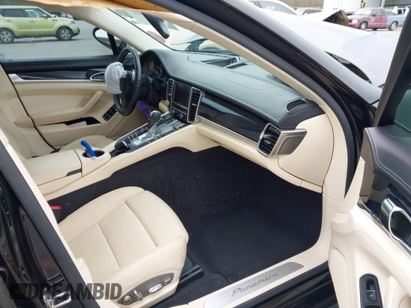 2015 Porsche Panamera 4 с VIN WP0AA2A70FL002802, выставлен на аукционе IAAI как лот 41303802 с пробегом 58 496 миль миль и . История ставок и продаж доступна на DreamBid. Изображение 5.