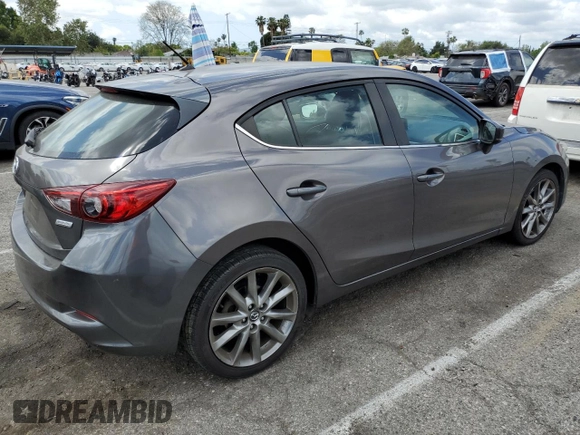 2018 Mazda 3 Touring z VIN 3MZBN1L38JM219466, wystawiony jako Copart lot #56766025 z przebiegiem 124 775 mil mil oraz Szkoda całkowita • Salvage title. Historia ofert i sprzedaży dostępna na DreamBid. Obrazek 3.