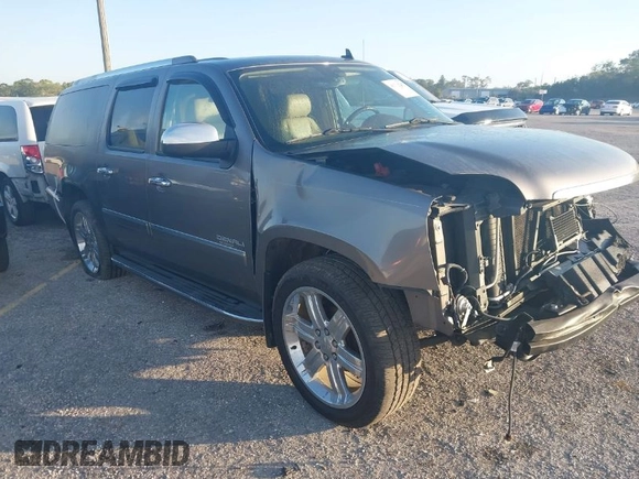 2011 GMC Yukon XL Denali with VIN 1GKS2MEF4BR280225, listed as a IAAI auction lot 41732220 with 121,684 mi miles. Bid and sale history available at carsss.com. Image 1.