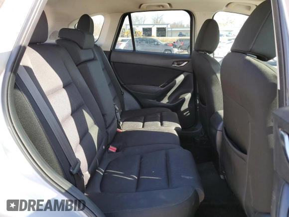 2016 Mazda CX-5 Touring with VIN JM3KE2CY8G0614335, listed as a Copart auction lot 52124465 with 218,320 mi miles and Salvage Title. Bid and sale history available at carsss.com. Image 11.