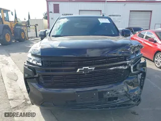 2023 Chevrolet Tahoe RST with VIN 1GNSCRKD3PR468757, listed as a IAAI auction lot 41557004 with 57,384 mi miles. Bid and sale history available at carsss.com. Image 12.